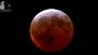 Stargazers enjoy shortest total lunar eclipse of century