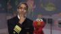 Elmo is scared of vaccines, but singing Taylor Swift helps him shake it off