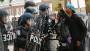 Protesters defy Baltimore curfew