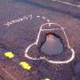 Street Artist Wanksy Puts A Huge Dick-Shaped Spotlight On Potholes